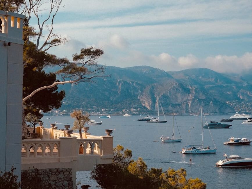 yachts anchored at shore