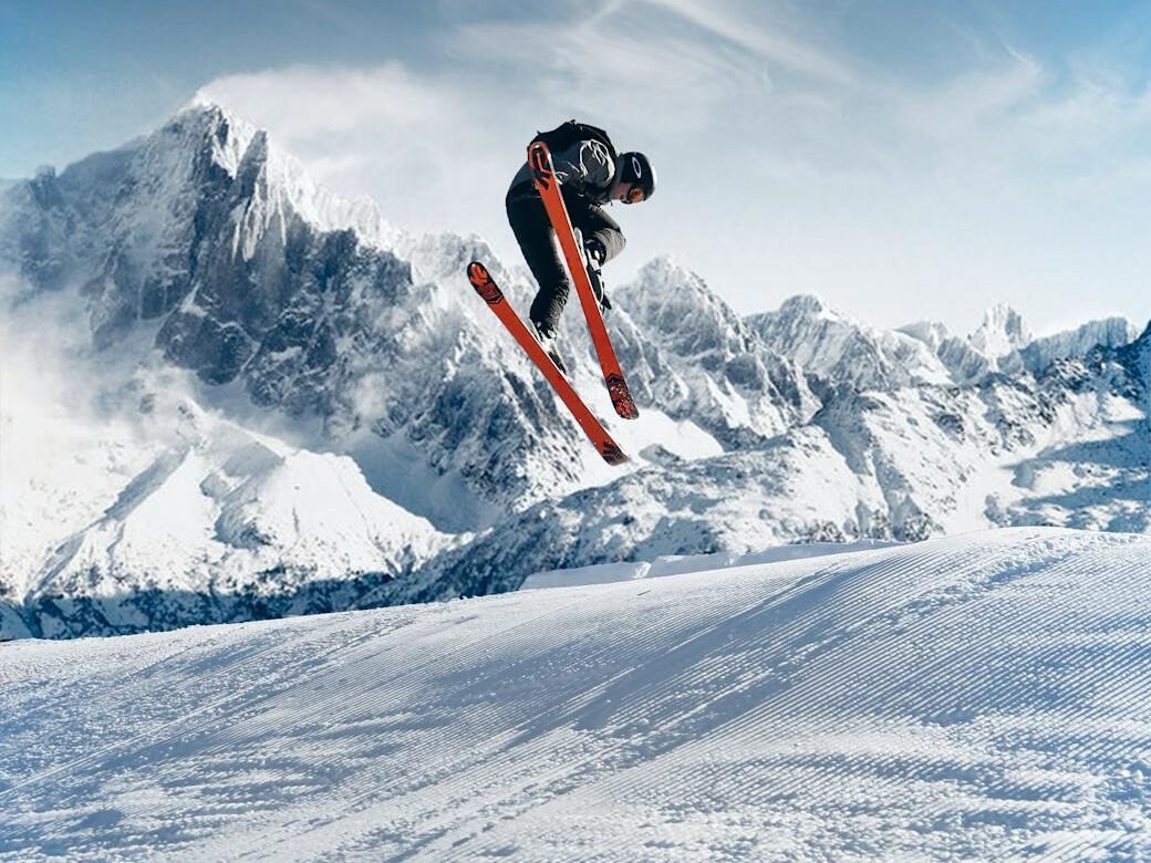 photo of person skiing on snowfield